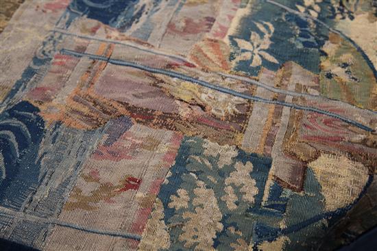 A 17th century tapestry fragment, W.3ft 4in. H.4ft 9in.